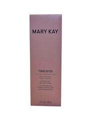 Model applying Mary Kay Timewise moisturizer for hydrated, smoother skin