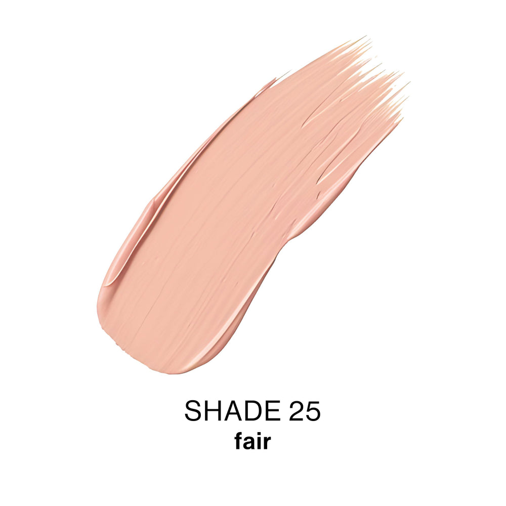 Max Factor Pan Stik held in hand for scale and portability, ideal for touch-ups
