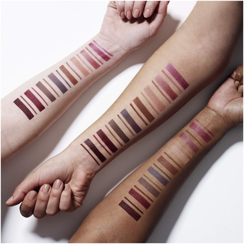 Maybelline Almond Rose held in hand to show pencil length and scale advantage