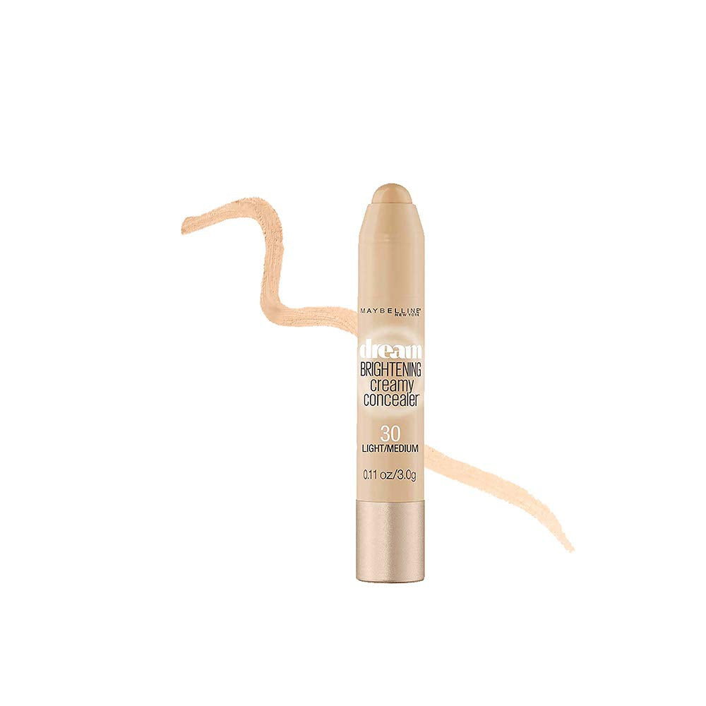 MAYBELLINE concealer held in hand to show 0.11 oz size and travel friendly benefit
