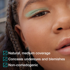 Maybelline Fit Me concealer held in hand to show size and portability benefit