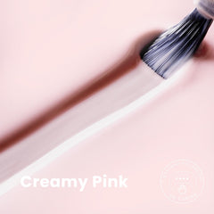 MAYCHAO brush stroke of creamy pink demonstrating smooth coverage