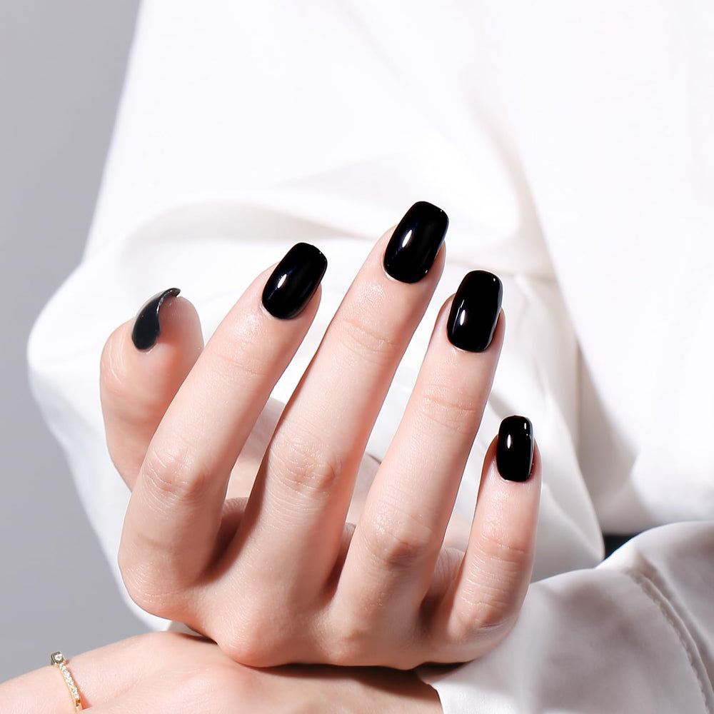 MAYCHAO cured nails studio shot showing glossy black finish and durability
