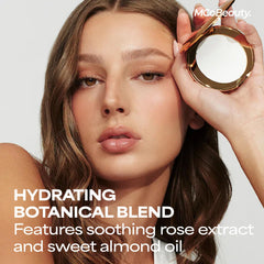 MCoBeauty application with brush showing even mattifying finish benefit