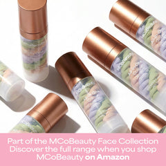 MCoBeauty bottle in hand to show 30 mL size and portable convenience