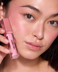 MCoBeauty gloss texture swiped on arm showing glossy finish and lightweight feel