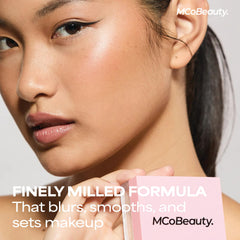 MCoBeauty powder applied with a fluffy brush for all-over matte control