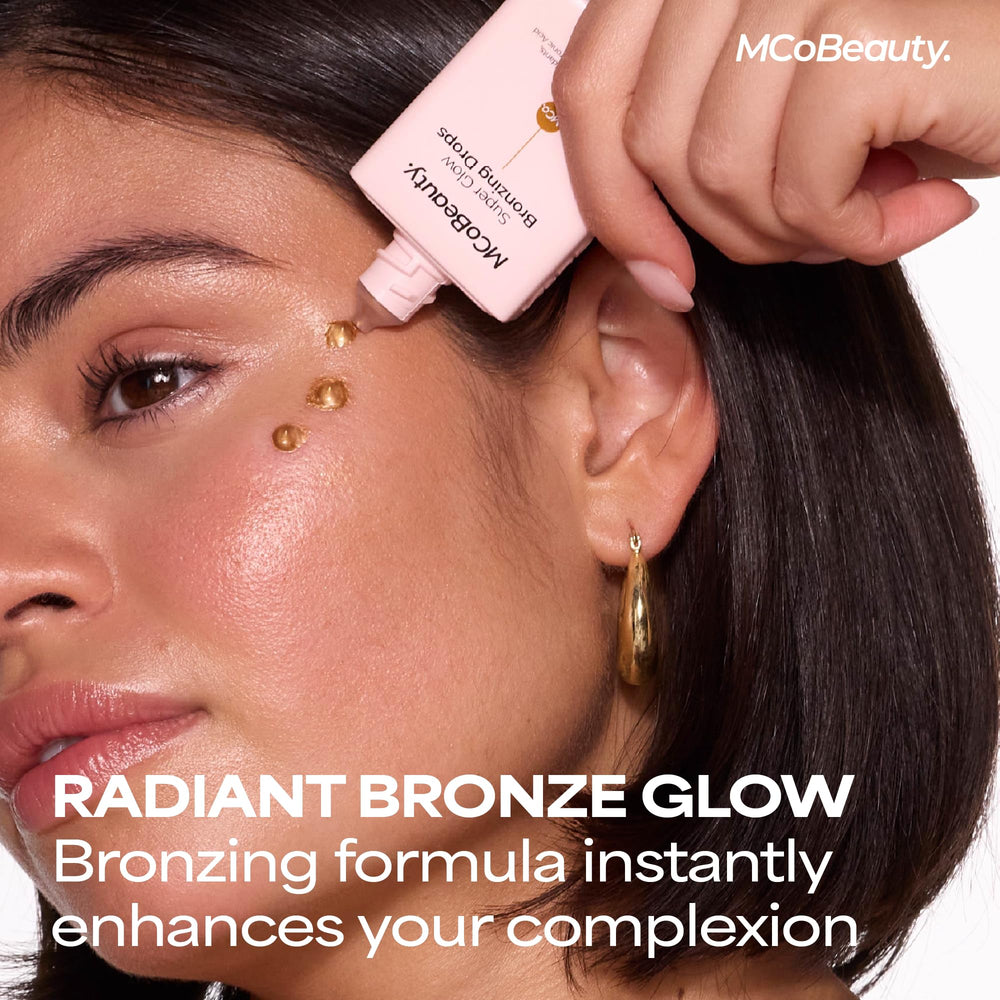 MCoBeauty dropper releasing bronzing liquid highlighting silky texture and blendability