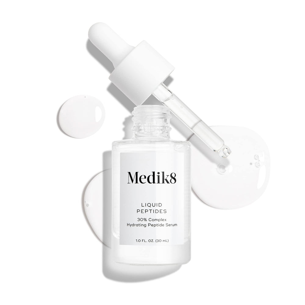 Medik8 bottle on bathroom vanity lifestyle scene implying daily routine benefits