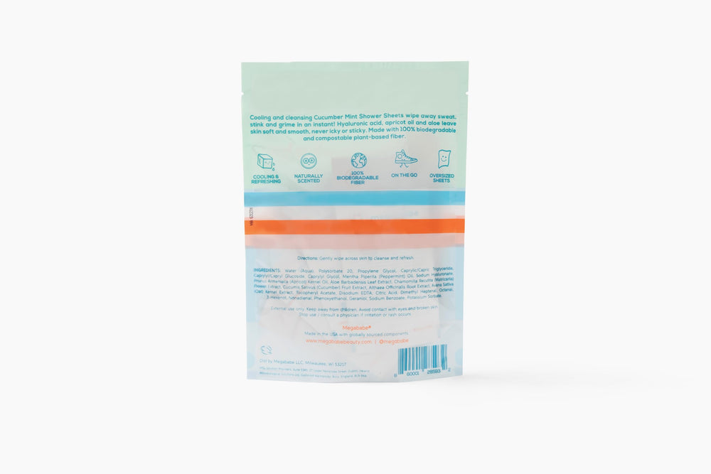 Megababe wipe used at beach providing cooling refresh after sun and activity