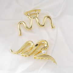 Mehayi three distinct clip styles laid flat offering versatile styling
