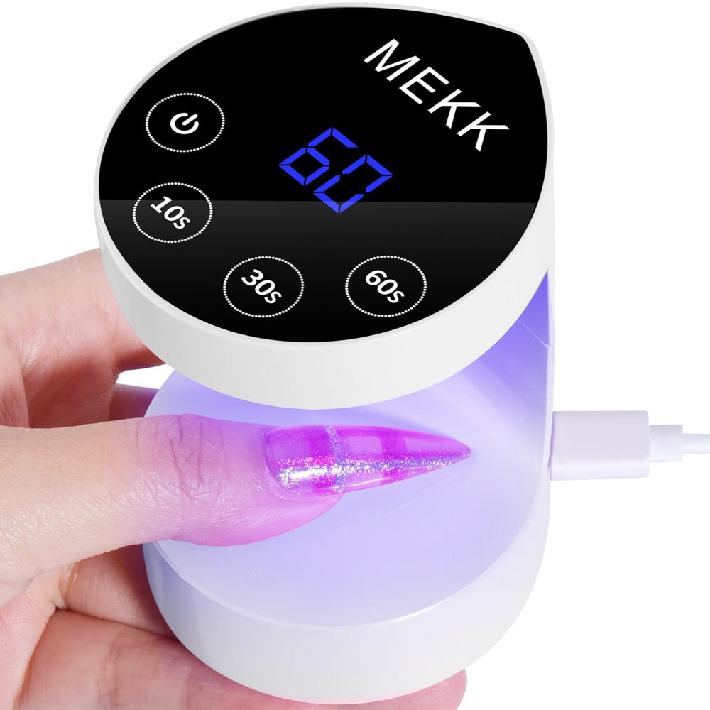 MEKK front view of peach-shaped mini lamp showing compact design and portability