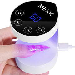 MEKK front view of peach-shaped mini lamp showing compact design and portability