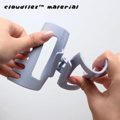 MELLO compressed against a car headrest showing travel-friendly flexibility
