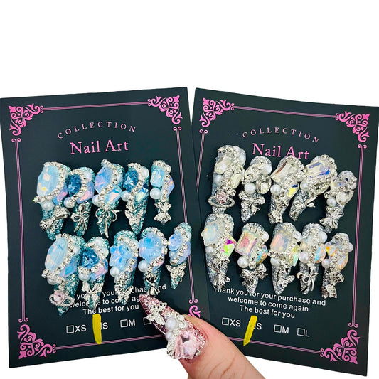 MellowBells front box packaging showing included mystery press-on nails and accessories