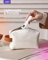 MelodySusie held in hand demonstrating pocket-sized portability