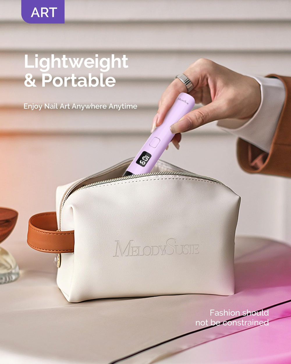 MelodySusie P-ART01R next to a phone to show pocket-sized portability benefit