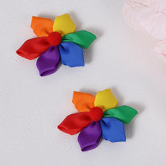 melyde lifestyle shot with outfit for Pride Month showing colorful supportive accessory
