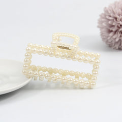 Merdia stored in travel pouch protecting clips and keeping pearls pristine