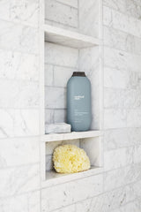 Method Juniper + Sage bottle in shower showing efficient everyday use