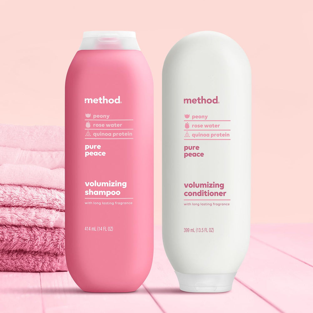 Method 14 oz bottle next to hand for size comparison and practicality
