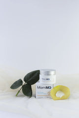 MiamiMD 1.7oz jar next to a coin showing compact travel-friendly benefit