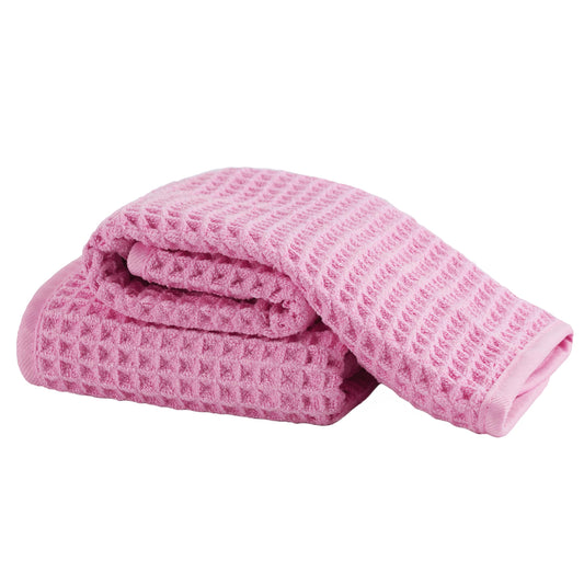 MICROFI front view of two pink towels showing compact packaging and quick-dry benefit
