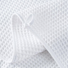 MICROFI towel edge and label detail showing OEKO-TEX safety certification benefit
