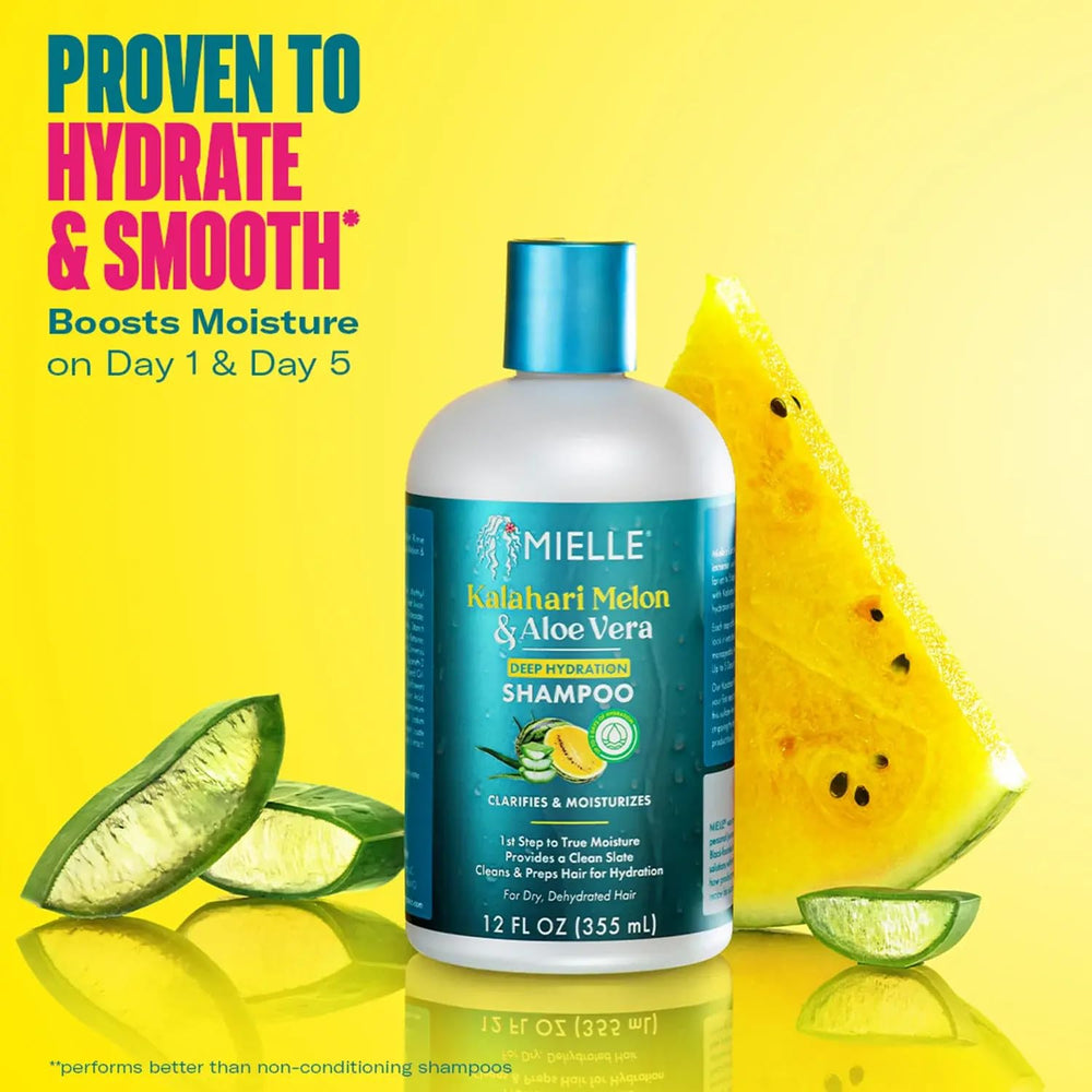 Mielle Organics bottle in hand for size comparison, helpful for portability and usage planning