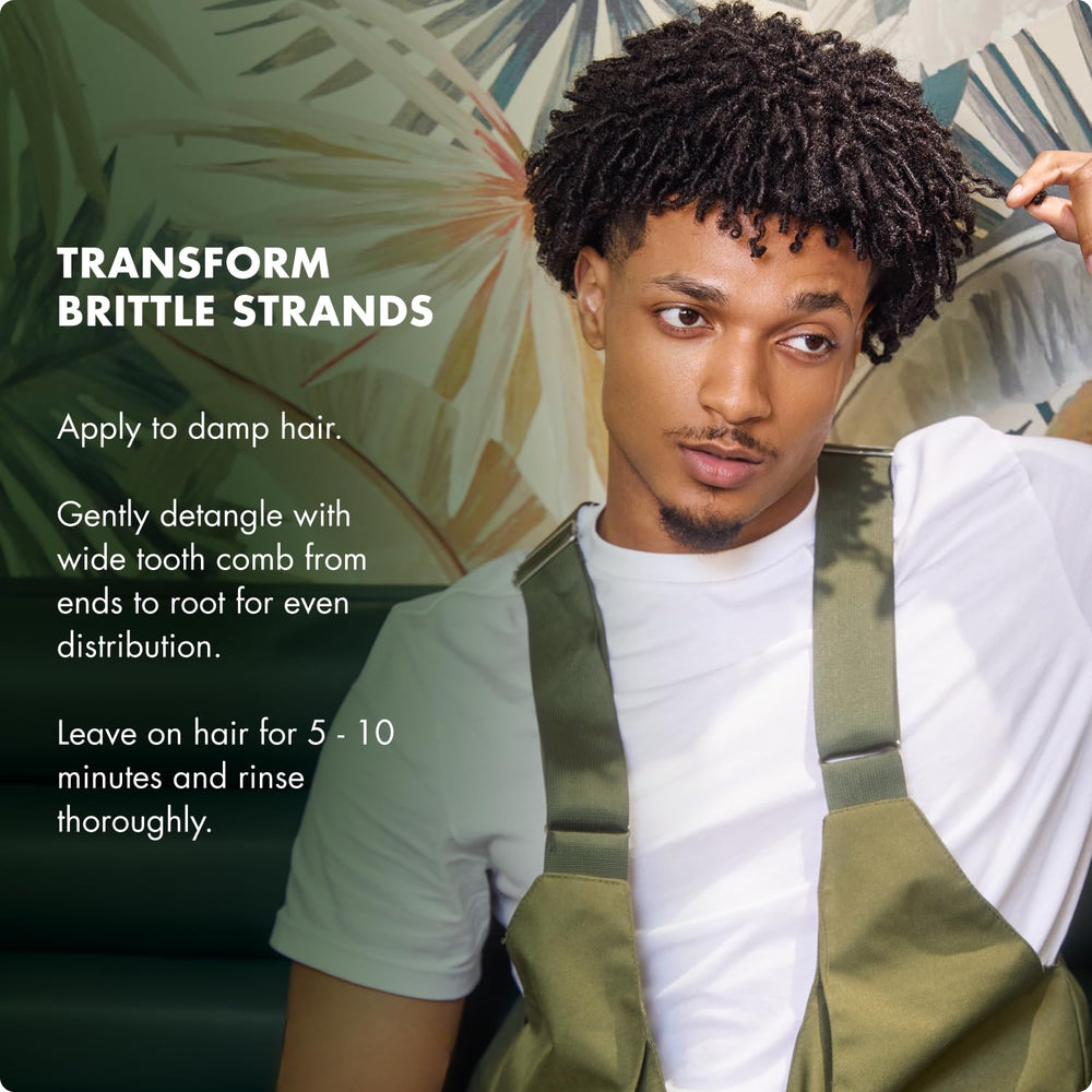 Mielle Organics label close-up featuring biotin and botanical ingredients for strength