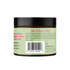 Mielle Organics jar on bathroom vanity lifestyle scene suggesting everyday grooming routine.