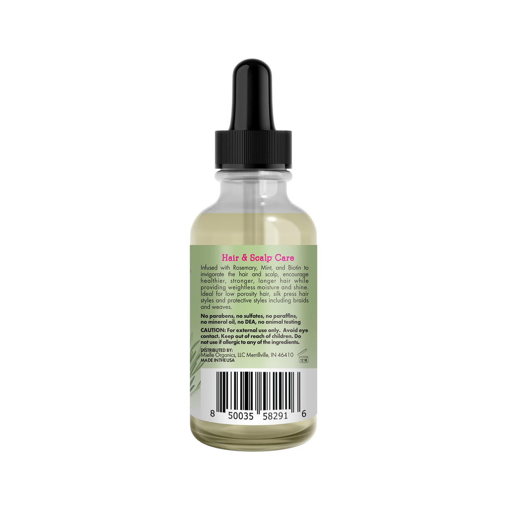 Mielle Organics applied to scalp during massage demonstrating soothing circulation and hydration