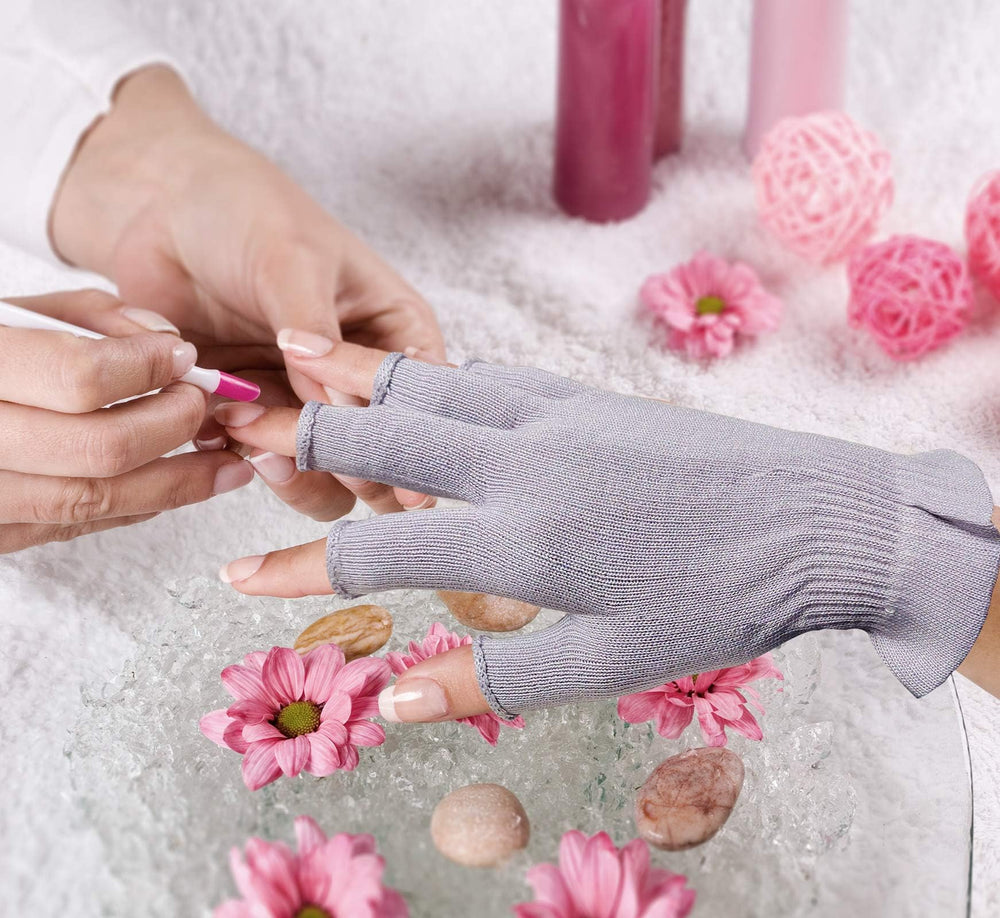 MIG4U gloves beside cream and towel suggesting spa treatment