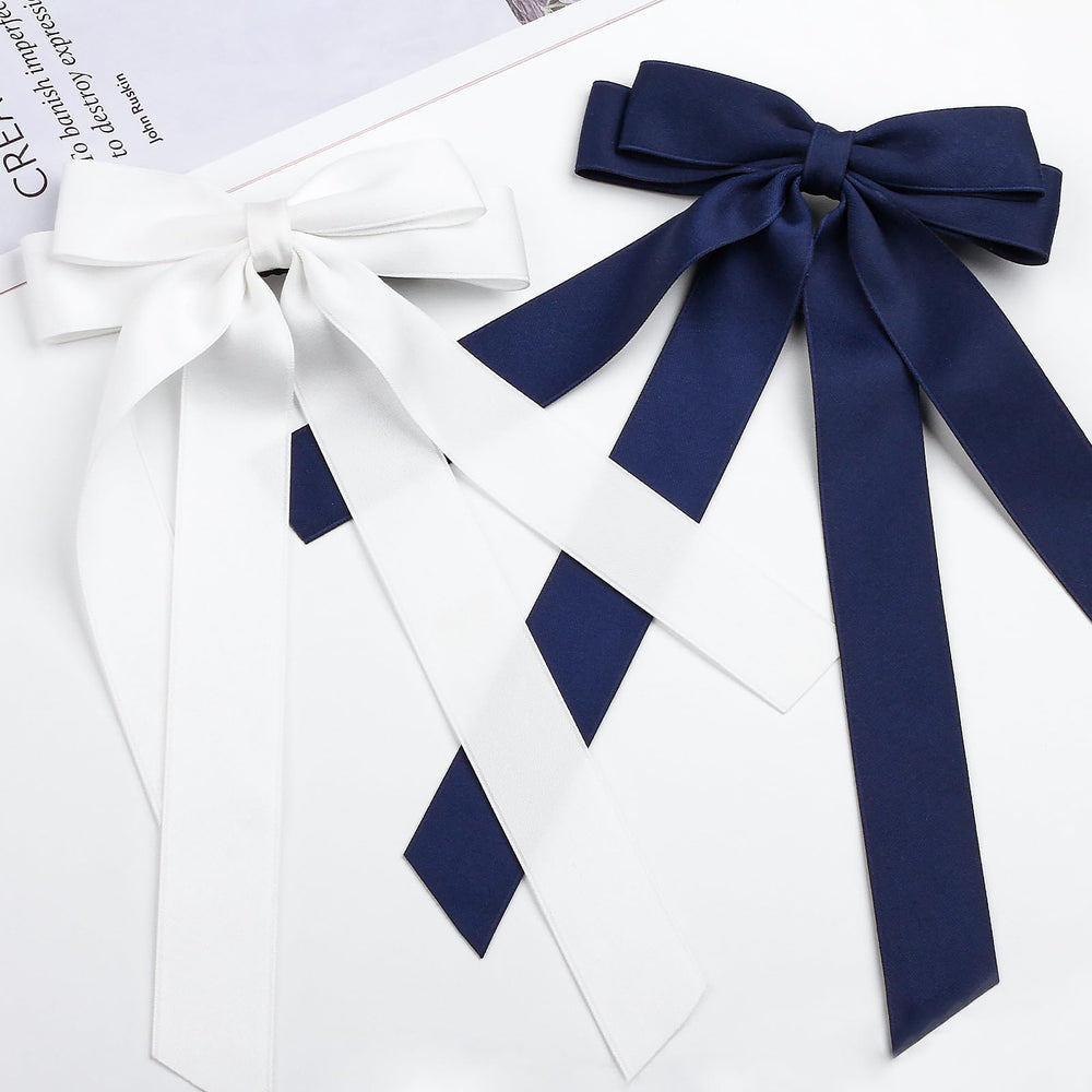 MIKONIKO bow styled on a table setting illustrating outfit coordination benefit