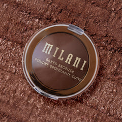 Milani bronzer size comparison with coin showing travel-friendly benefit