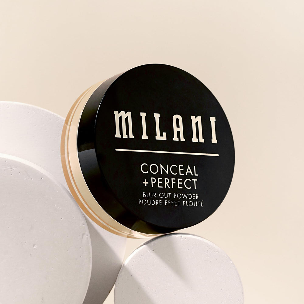 Milani powder being picked up by brush to demonstrate lightweight, diffused application