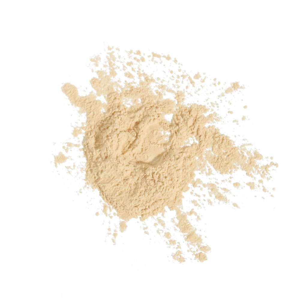 Milani powder in hand for scale highlighting portable, travel-ready convenience