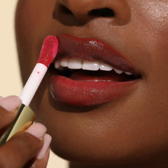 Milani in a handbag lifestyle photo showing portability and on-the-go refresh benefit