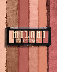 Milani open palette overhead view showing six rose-hued pans, organized color coordination benefit