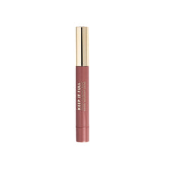 Milani tube beside ruler showing compact size and travel-friendly benefit