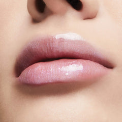 Milani shade swatch on arm showing Sparkling Pink radiance and buildable color benefit