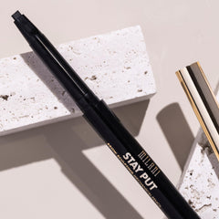 Milani brow pencil being applied on brows for defined, long-lasting wear