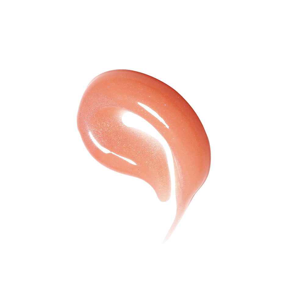 Milani gloss next to lipstick showing compact scale and easy portability benefit