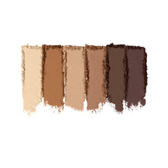 Milani palette beside a makeup bag showing scale for travel-friendly convenience