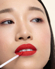 Milani worn on model lips, demonstrates true color payoff and all-day hold