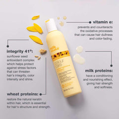 milk_shake 1.7 fl oz bottle held in hand to show travel-friendly size advantage