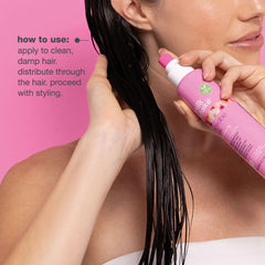 milk_shake being sprayed on damp hair to detangle and prep for styling
