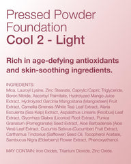 Mineral Fusion being used to touch up T-zone in mirror for shine control benefit