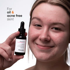 Minimalist bottle held in hand to show 30ml size and portability