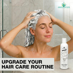 Miracle of Aloe bottle beside fresh aloe leaves highlighting UltraAloe content